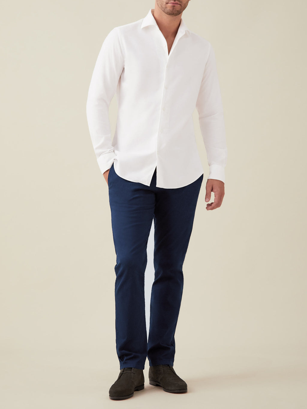 Front view of a model wearing the Luca Faloni White Brushed Cotton Shirt with navy trousers against a plain background.