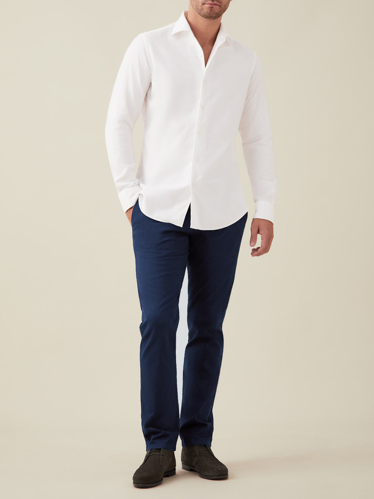 Front view of a model wearing the Luca Faloni White Brushed Cotton Shirt with navy trousers against a plain background.