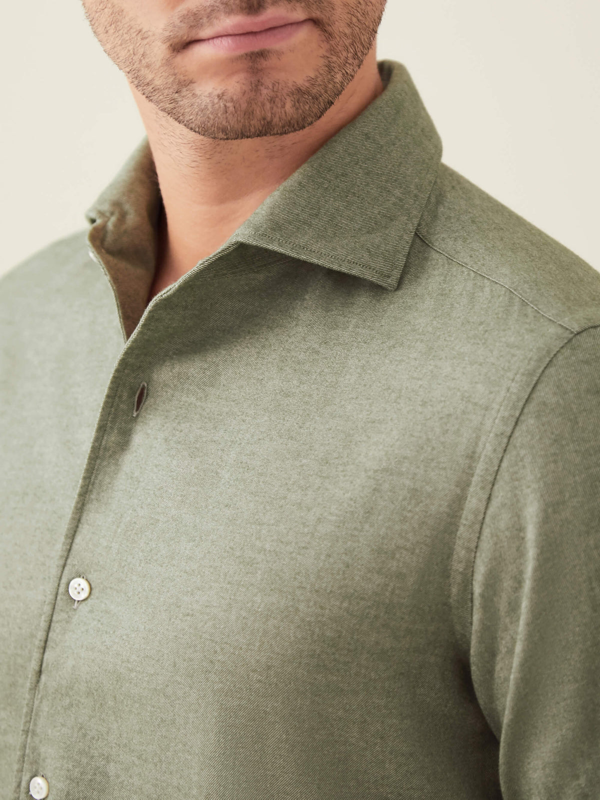 A close-up of the Luca Faloni Brushed Cotton Shirt in Moss Green, showing the signature one-piece collar and soft texture.