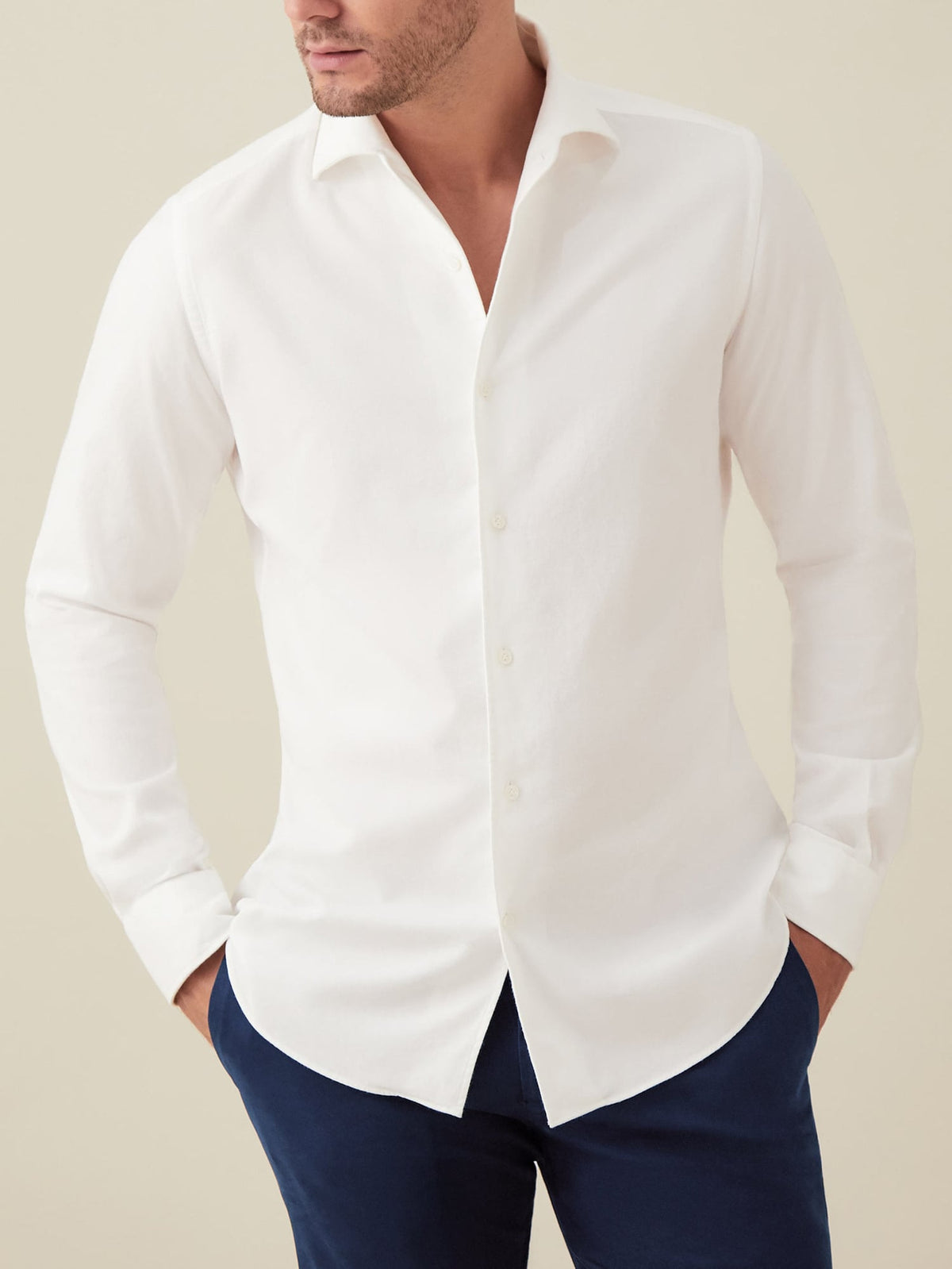 Front view of a model wearing the Luca Faloni White Brushed Cotton Shirt paired with navy trousers.