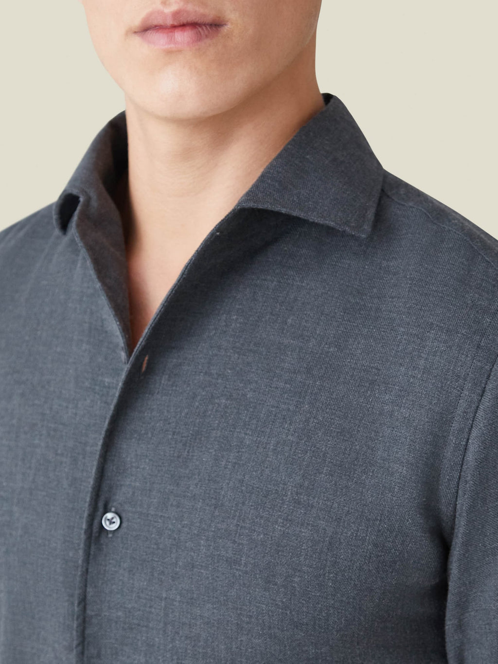 A close-up of the Charcoal Grey Cashmere-Cotton Shirt, focusing on its signature one-piece collar and soft mélange fabric.