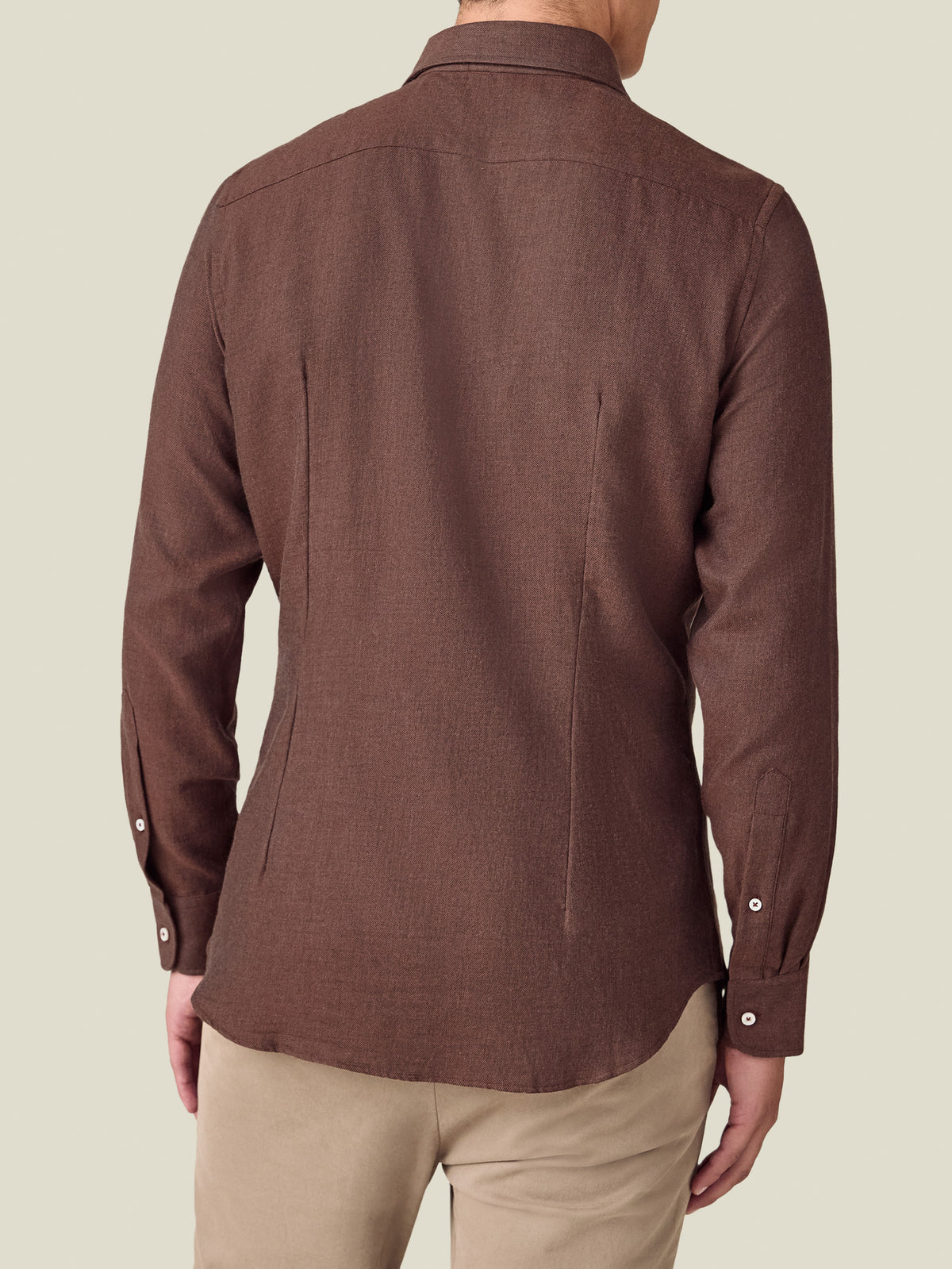 Back view of a model wearing the Luca Faloni Cashmere-Cotton Shirt in rust.
