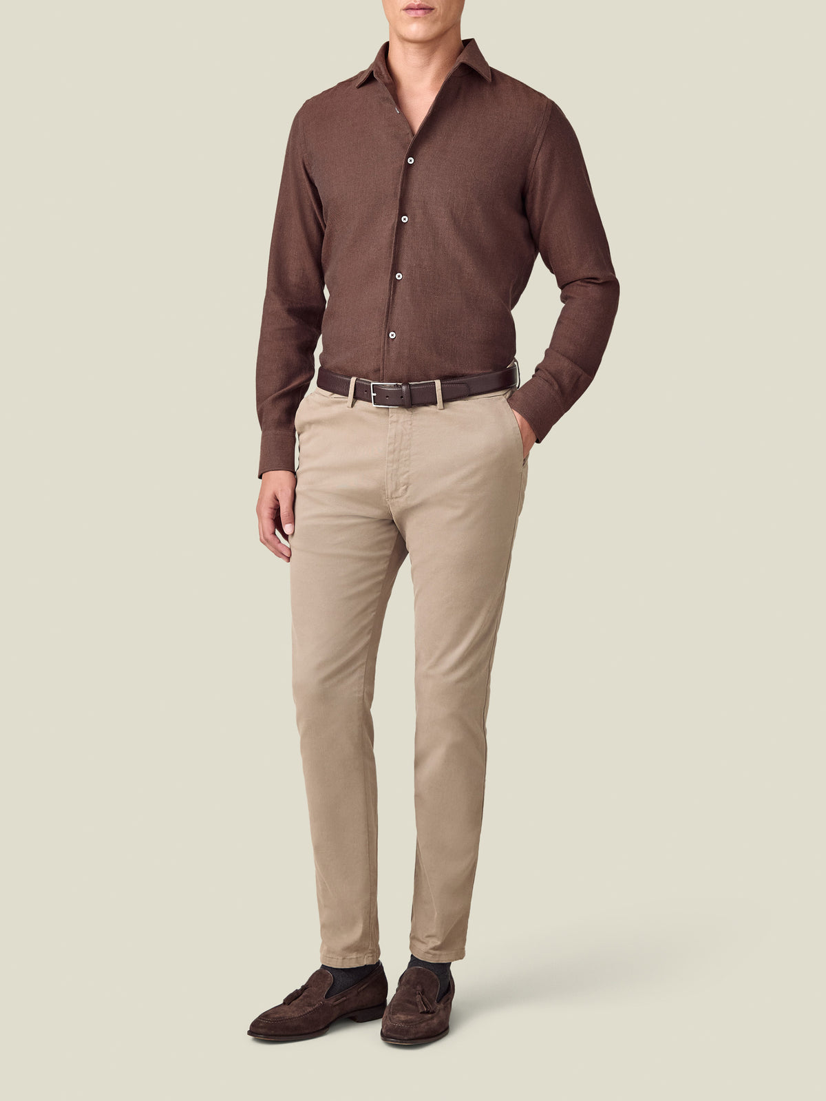 Front view of a model wearing the Luca Faloni rust Cashmere-Cotton Shirt, paired with beige chinos and brown suede loafers.