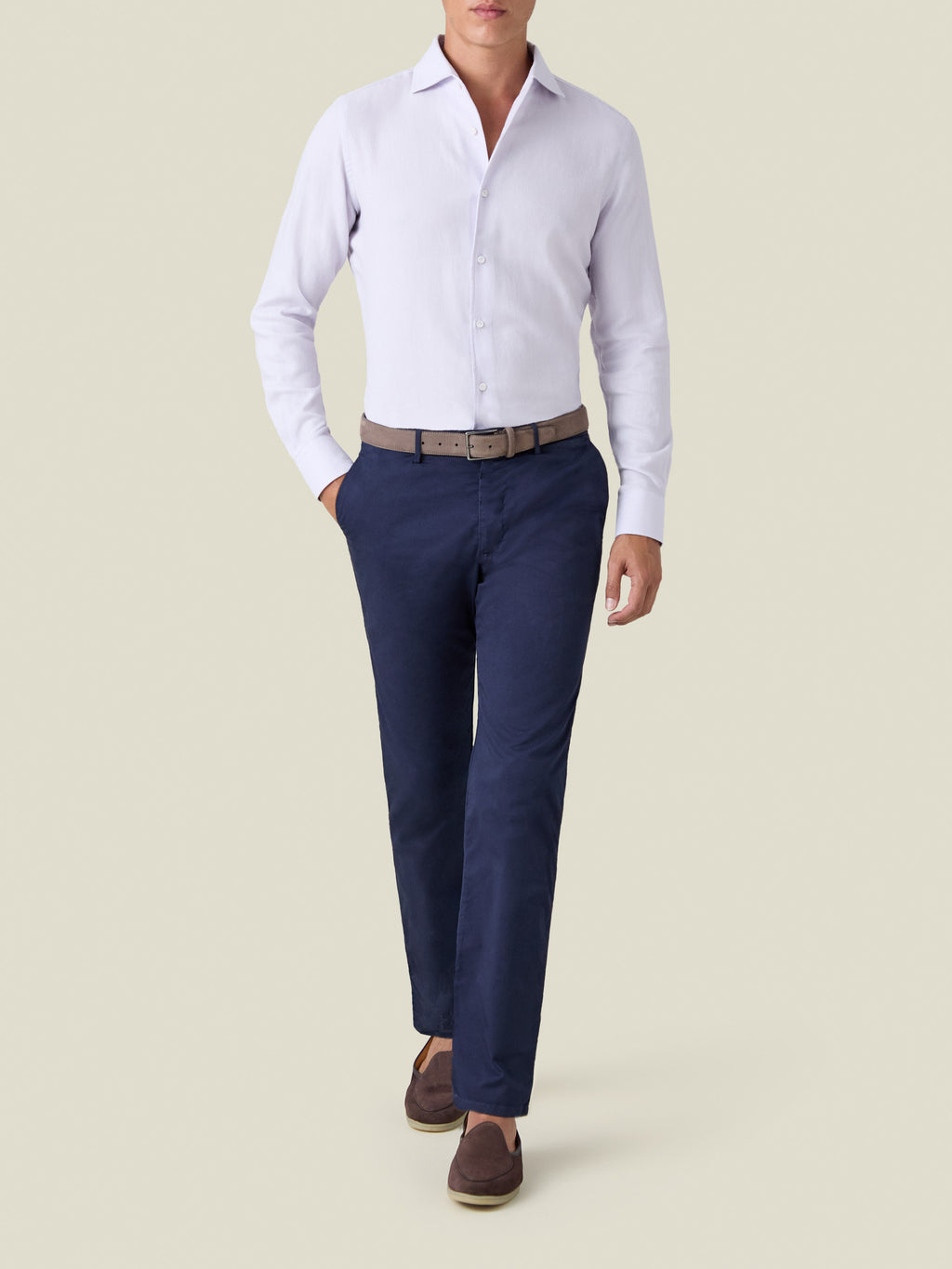 Full-length view of a model wearing the Lilac Cashmere-Cotton Shirt paired with navy trousers and brown loafers.