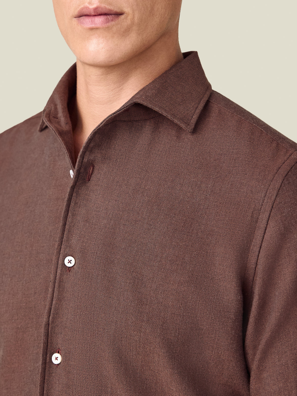 A close-up of the Luca Faloni Cashmere-Cotton Shirt in rust, detailing the one-piece collar and soft fabric texture.