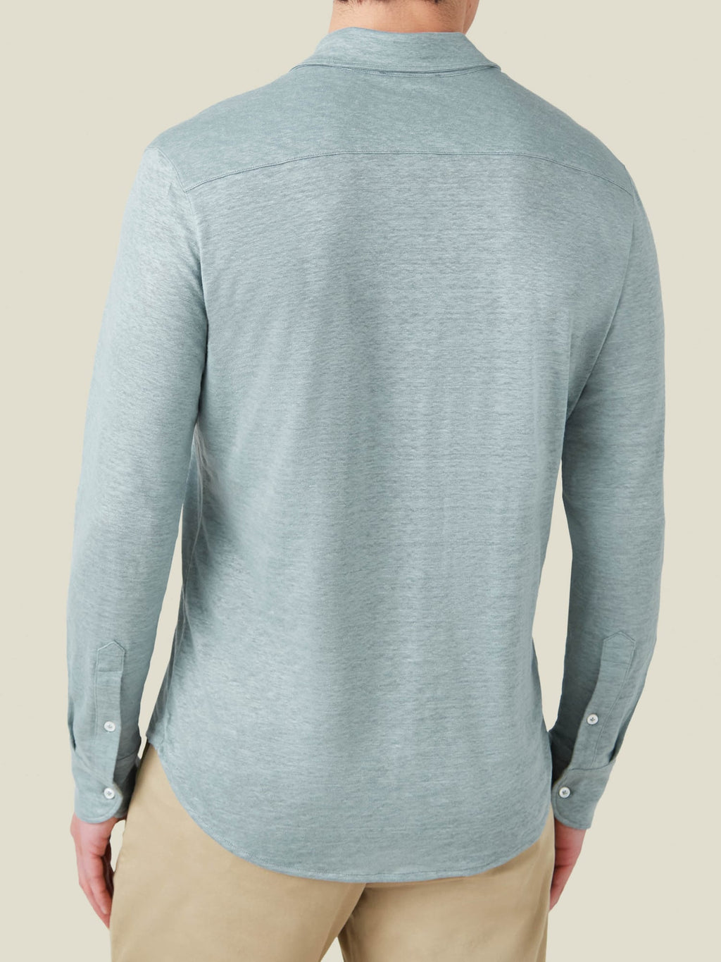 Back view of a man wearing the Luca Faloni Linen Jersey Shirt in Sea Grey.