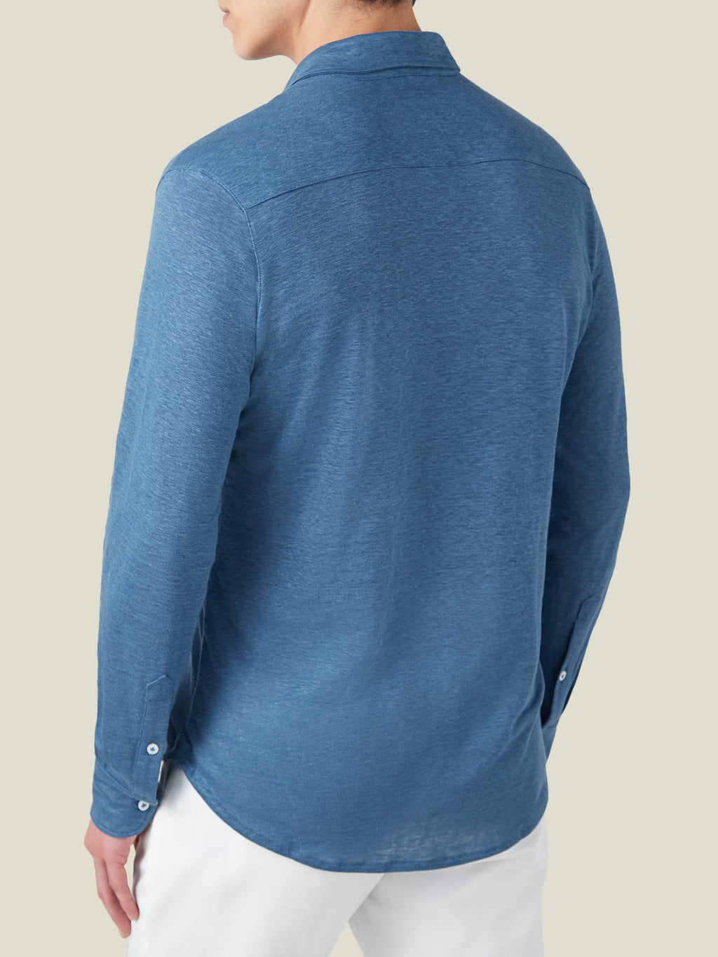 Back view of the Luca Faloni Steel Blue Linen Jersey Shirt, showcasing the relaxed fit and fine texture.