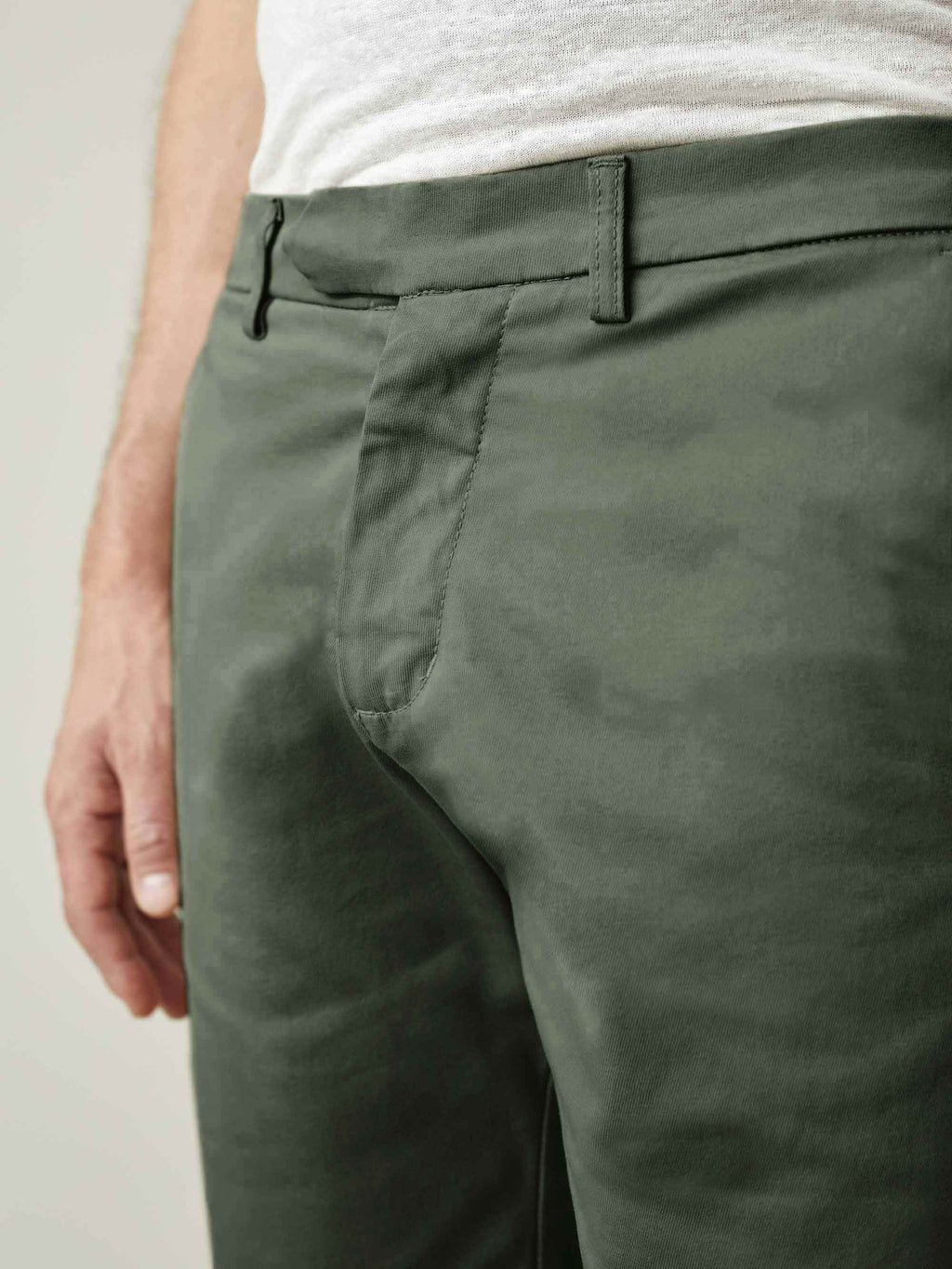 A detailed close-up of the Olive Green Cotton Shorts, highlighting the whipcord fabric and concealed button fly.