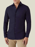 Front view of a man wearing the Luca Faloni Oxford Cotton Shirt in Midnight Blue, paired with khaki trousers.