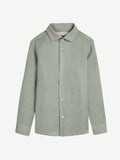 A front view of the Portofino Junior Linen Shirt in sage green, laid flat against a white background.