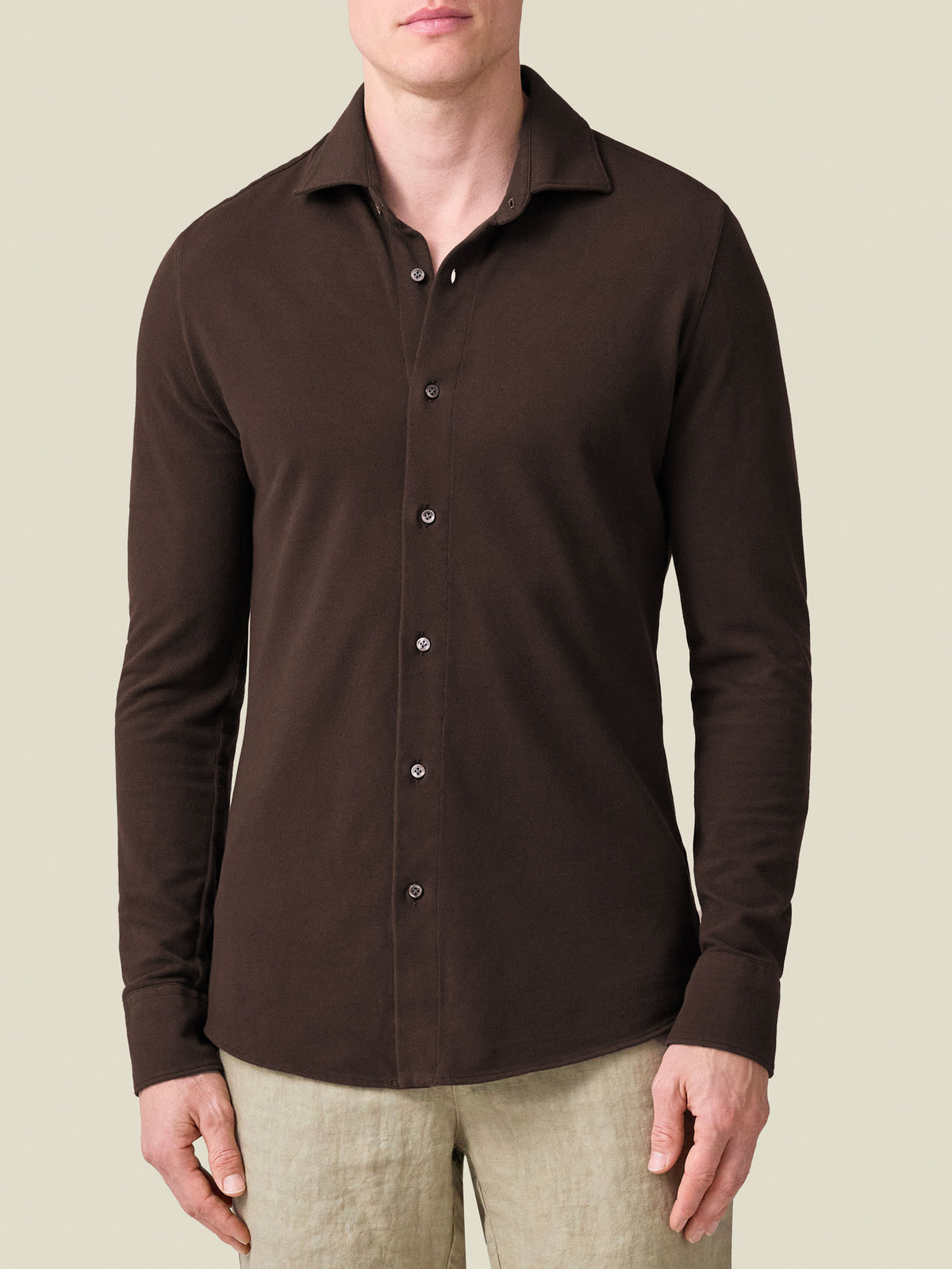 Front view of a model wearing the Luca Faloni Siena Piqué Shirt in Chocolate Brown.