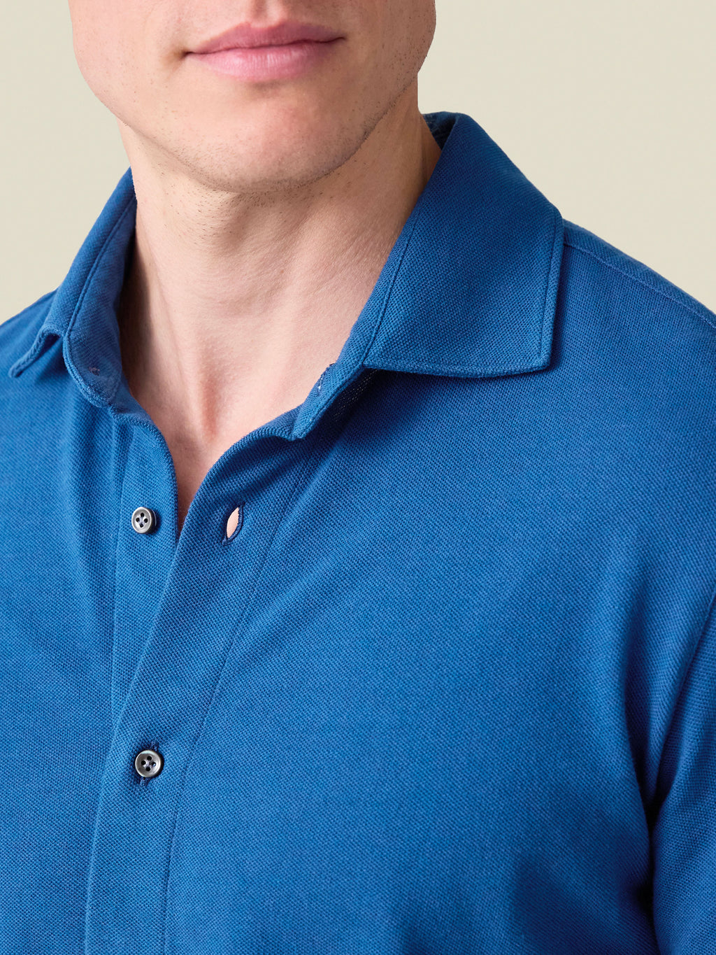 A close-up of the Siena Piqué Shirt in royal blue, highlighting the cutaway collar and textured cotton piqué fabric.