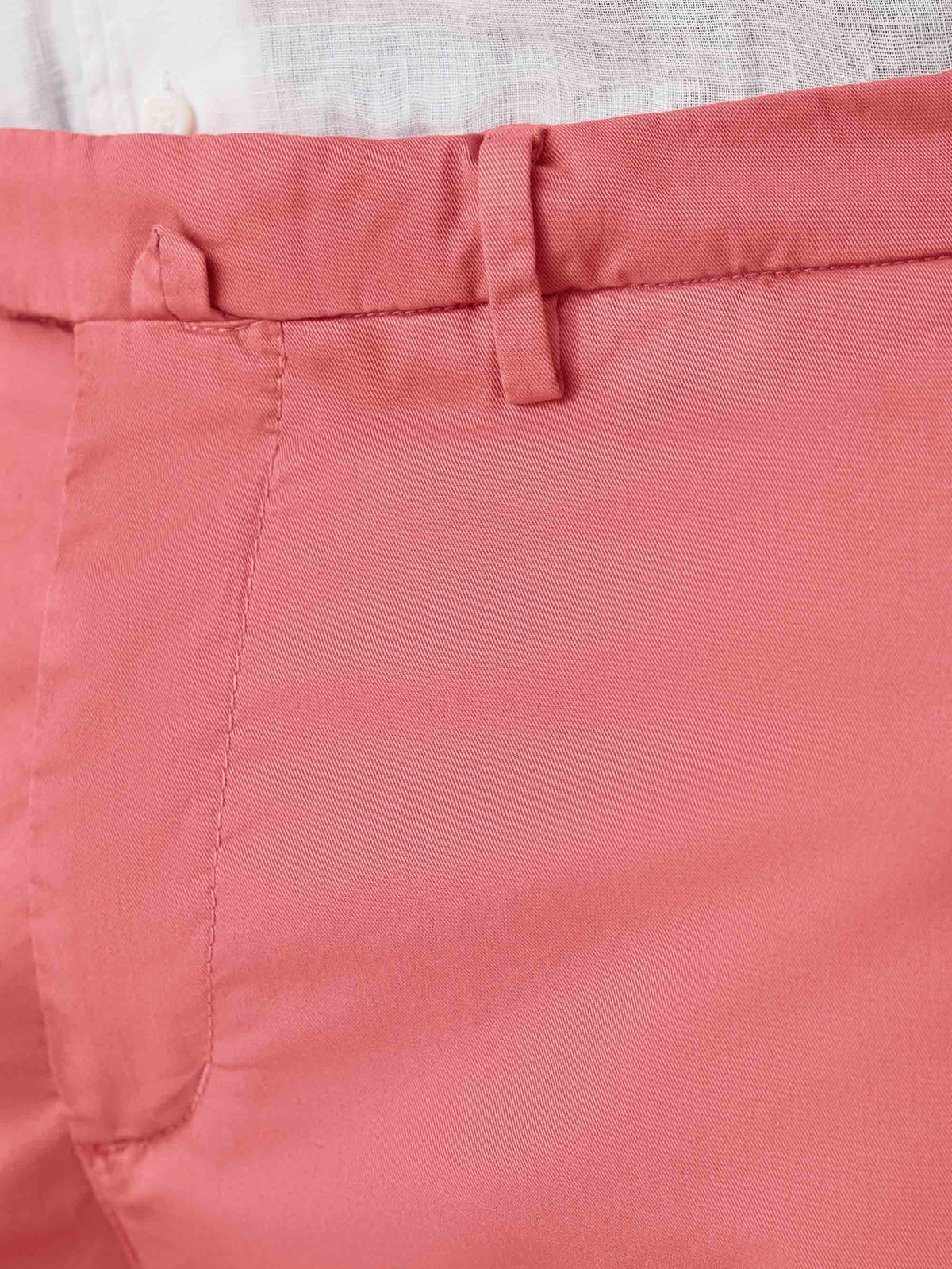 Close-up of the Strawberry Lightweight Cotton Chinos waistband, showing the belt loop and fine whipcord cotton texture.