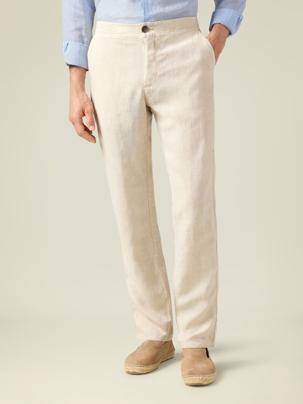 Front view of a model wearing the Luca Faloni Lipari Linen Trousers in sand against a plain background.