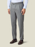 Front view of a model wearing the Luca Faloni light grey Wool Pleated Trousers.