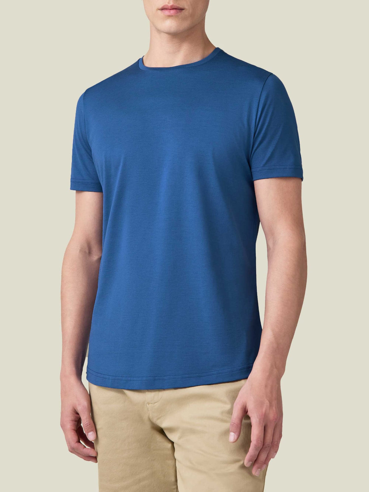 A model wearing the Luca Faloni Silk-Cotton T-Shirt in Royal Blue, viewed from the front.