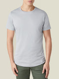 Front view of a model wearing the Luca Faloni Silk-Cotton T-Shirt in light grey.