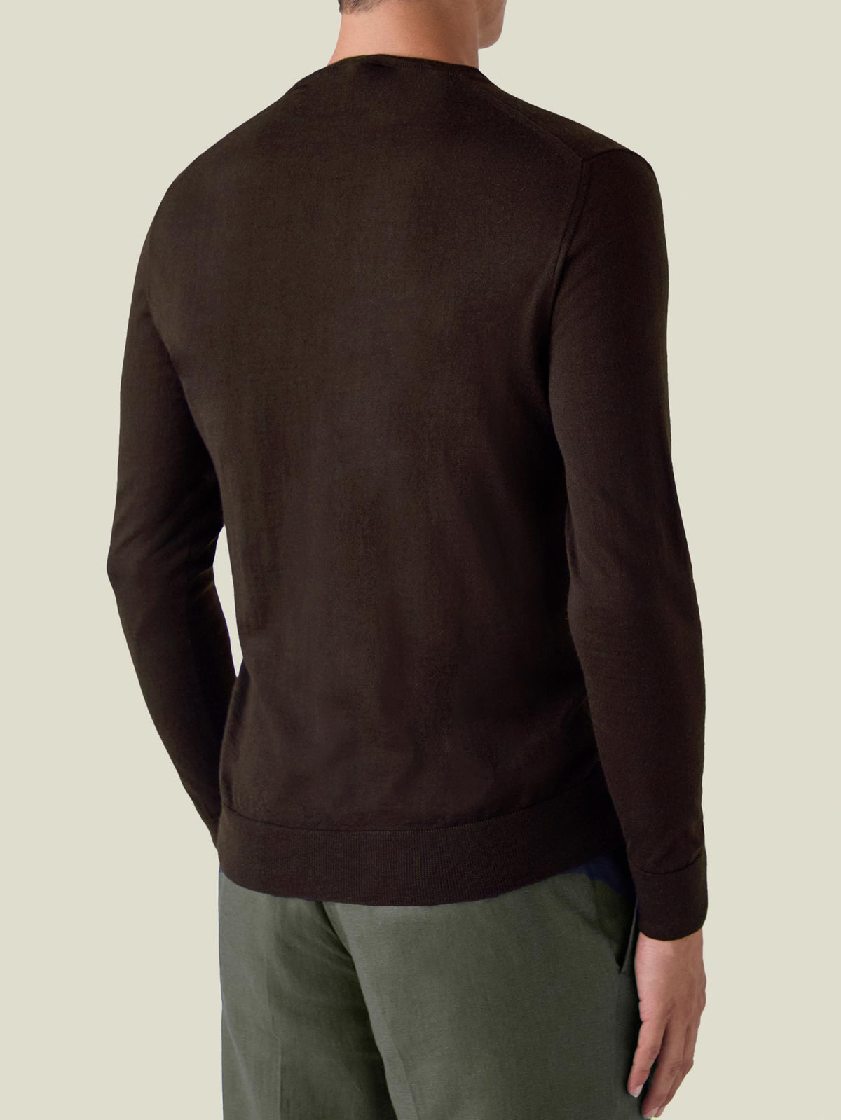 Back view of a model wearing the Chocolate Brown Silk-Cashmere V-Neck.