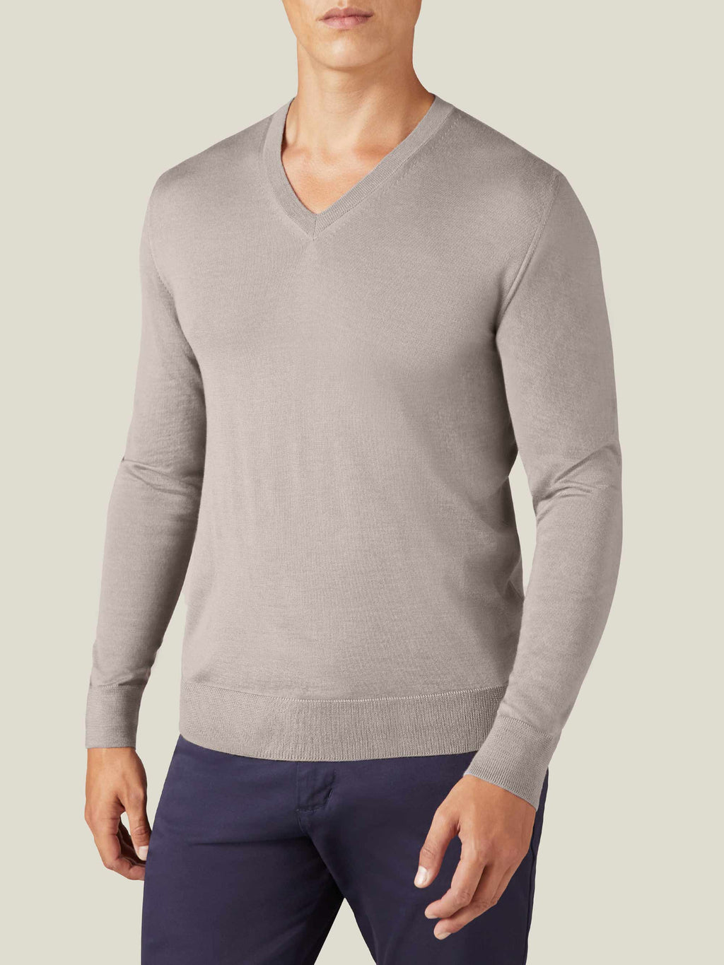 Front view of a man wearing a Luca Faloni Silk-Cashmere V-neck in Nocciola Brown against a plain background.
