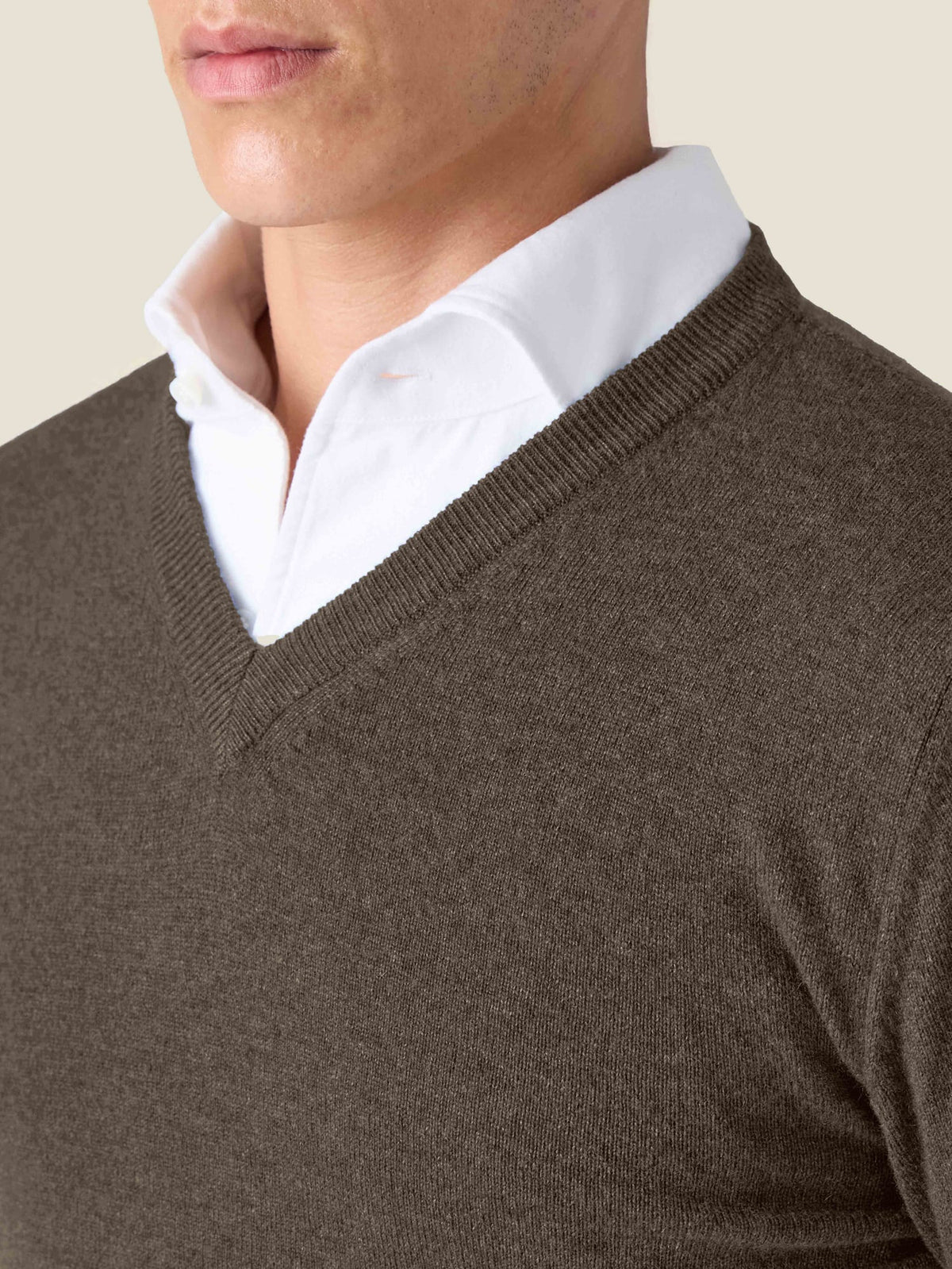 Close-up of the Luca Faloni Chocolate Brown Cashmere V Neck, styled over a white shirt showing the fine ribbed neckline.