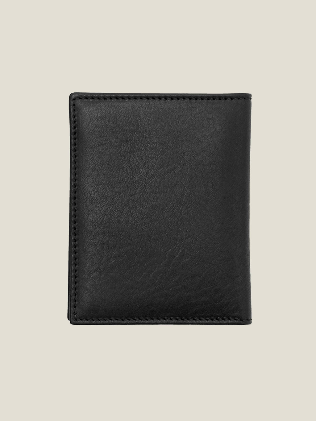 The Luca Faloni black leather bifold cardholder shown closed, highlighting the fine stitching and full-grain leather texture.