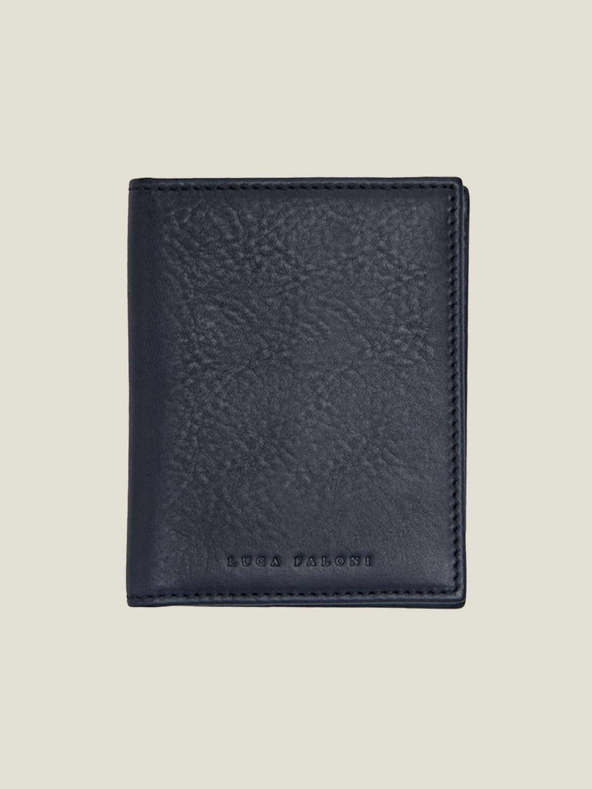 Front view of the Luca Faloni Bifold Cardholder in ink blue Italian leather, shown closed against a plain background.