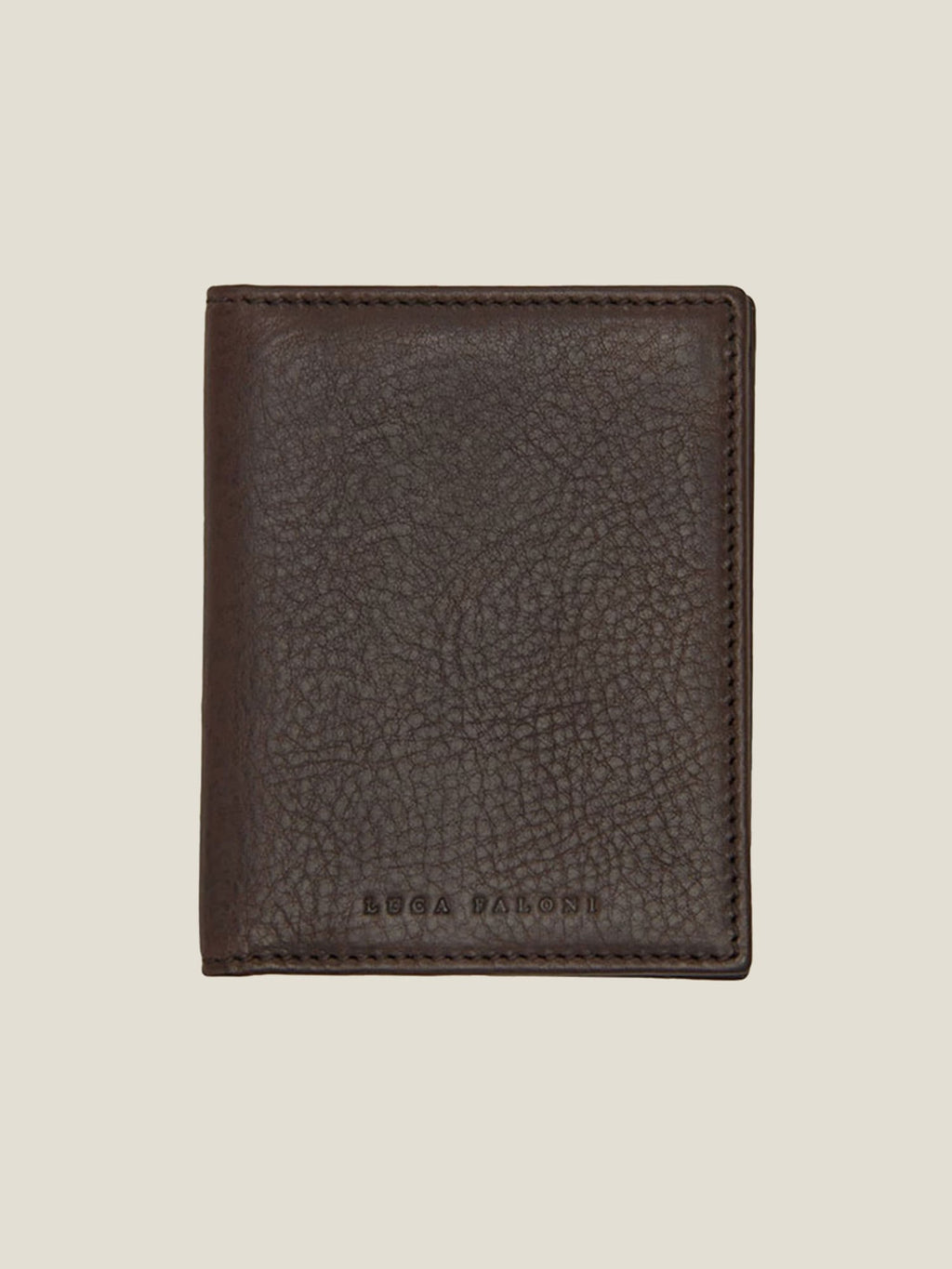 Luca Faloni's Italian-made Bifold Cardholder in chocolate brown leather, shown closed from the front.