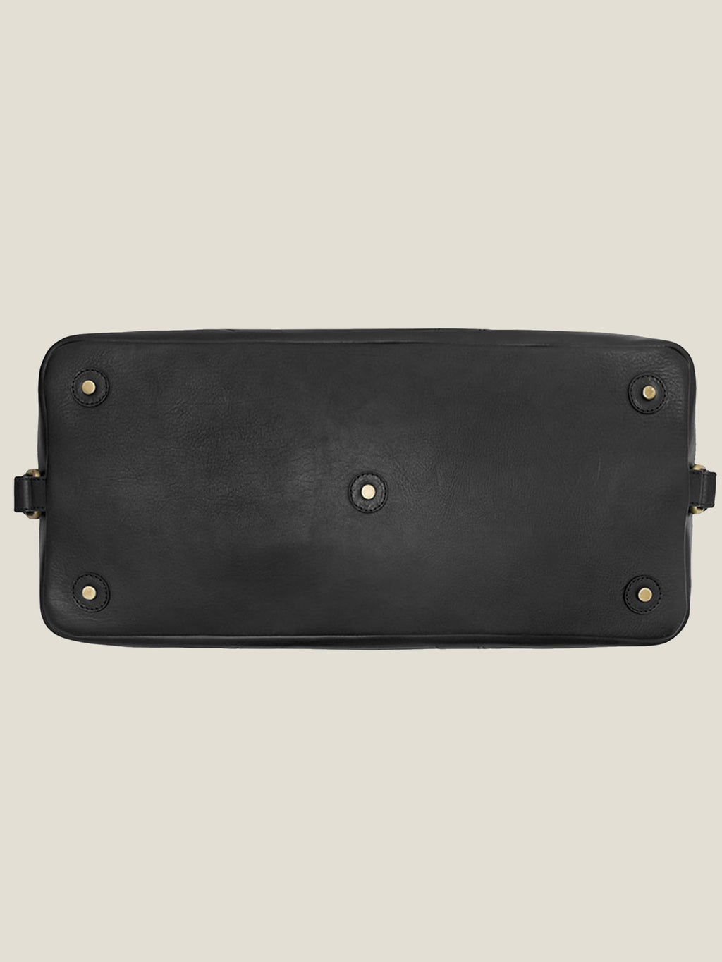Close-up of the base of the Luca Faloni Black Leather Weekender, showing its protective metal studs.