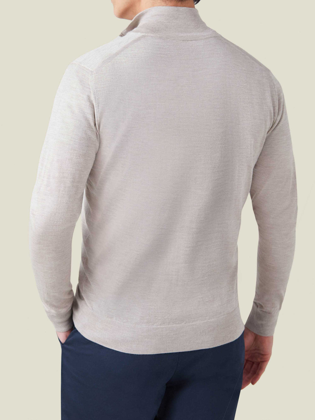 Rear view of a man wearing the Oatmeal Silk-Cashmere Zip Cardigan.