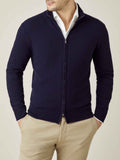 Front view of a man wearing the Midnight Blue Cashmere Zip Cardigan layered over a white collared shirt.
