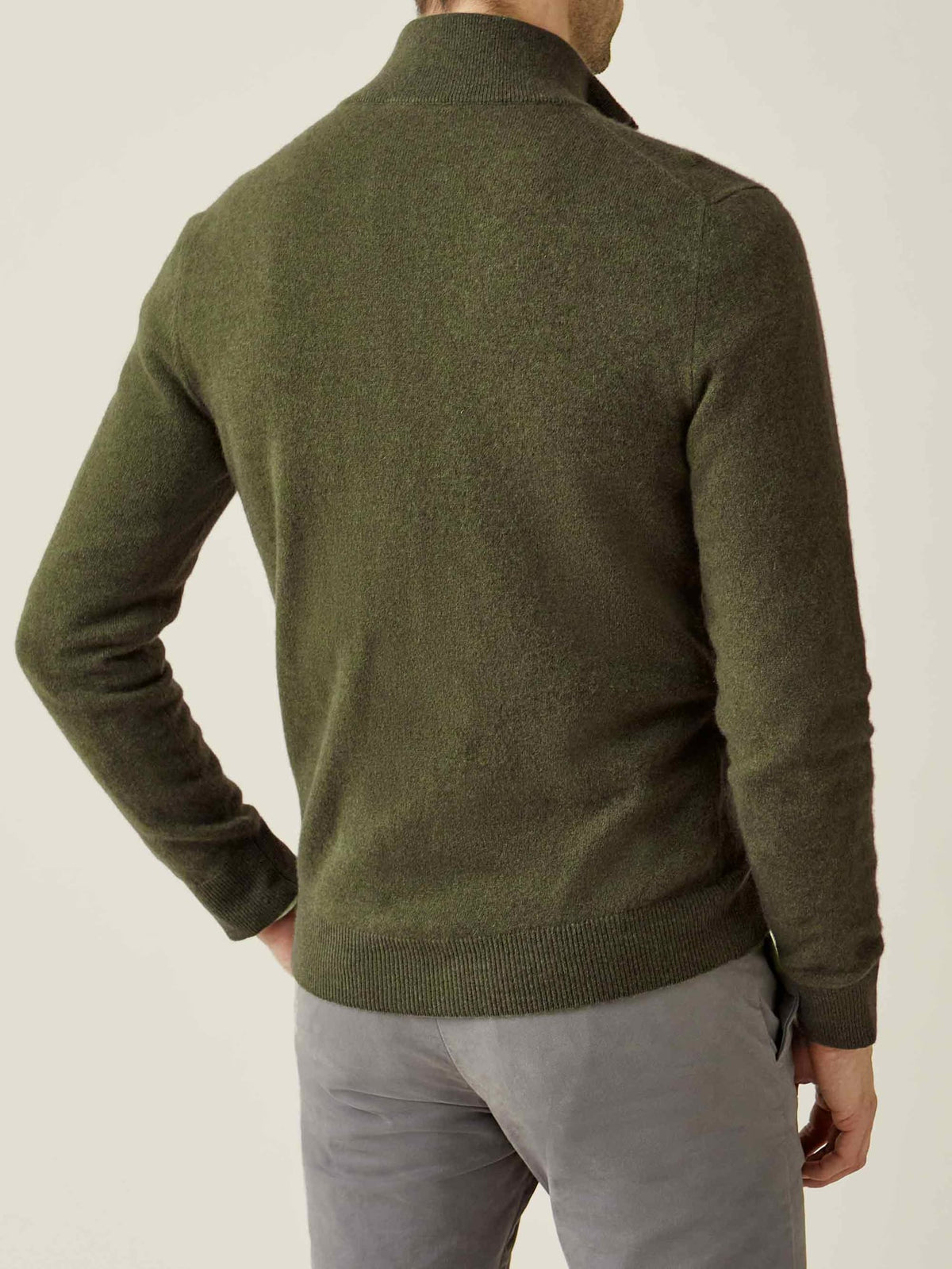 Back view of a man wearing the Luca Faloni Cashmere Zip Cardigan in Hunting Green.
