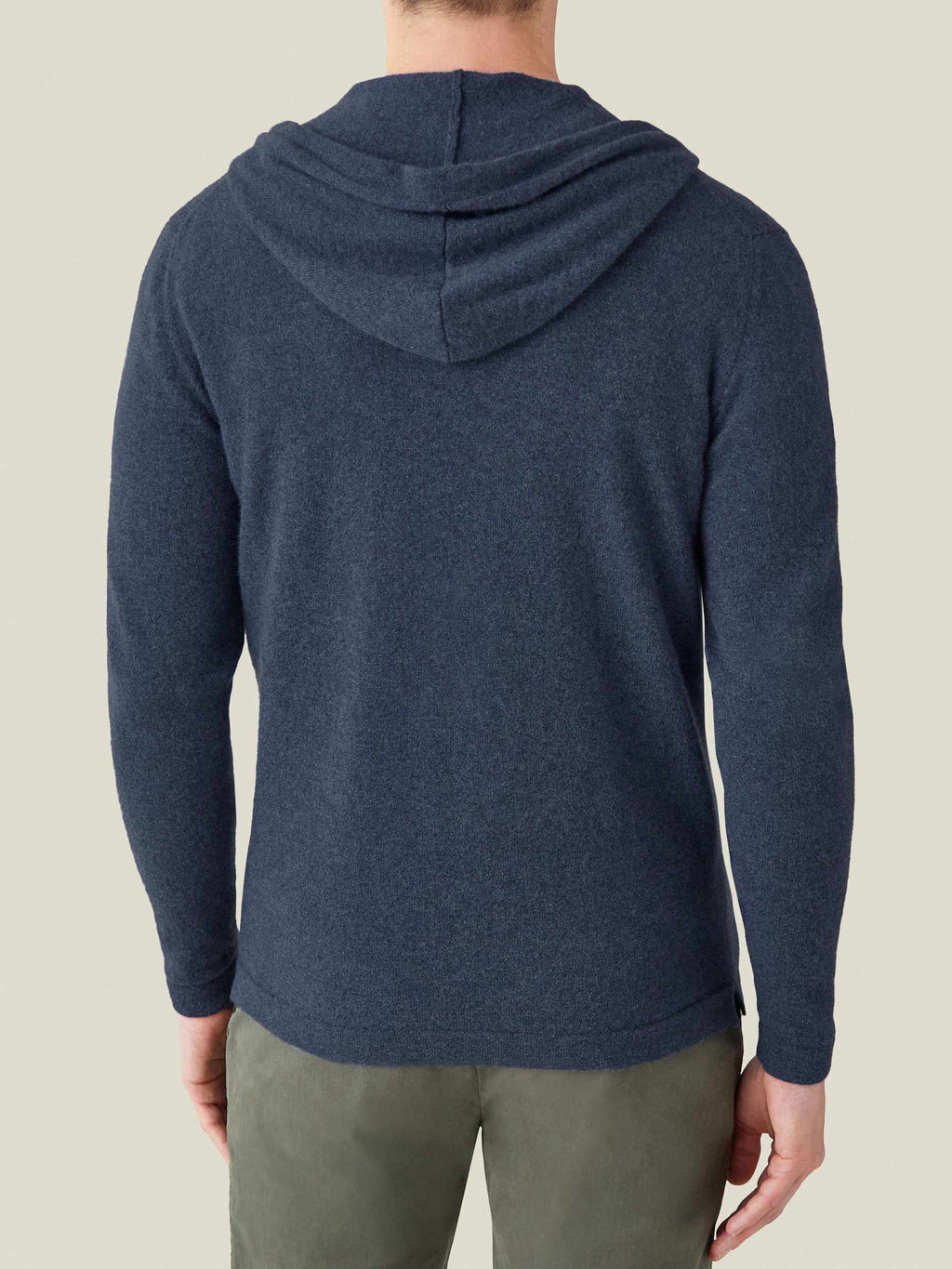 Back view of a model wearing the Luca Faloni Atlantic Blue Cashmere Zip Hoodie.