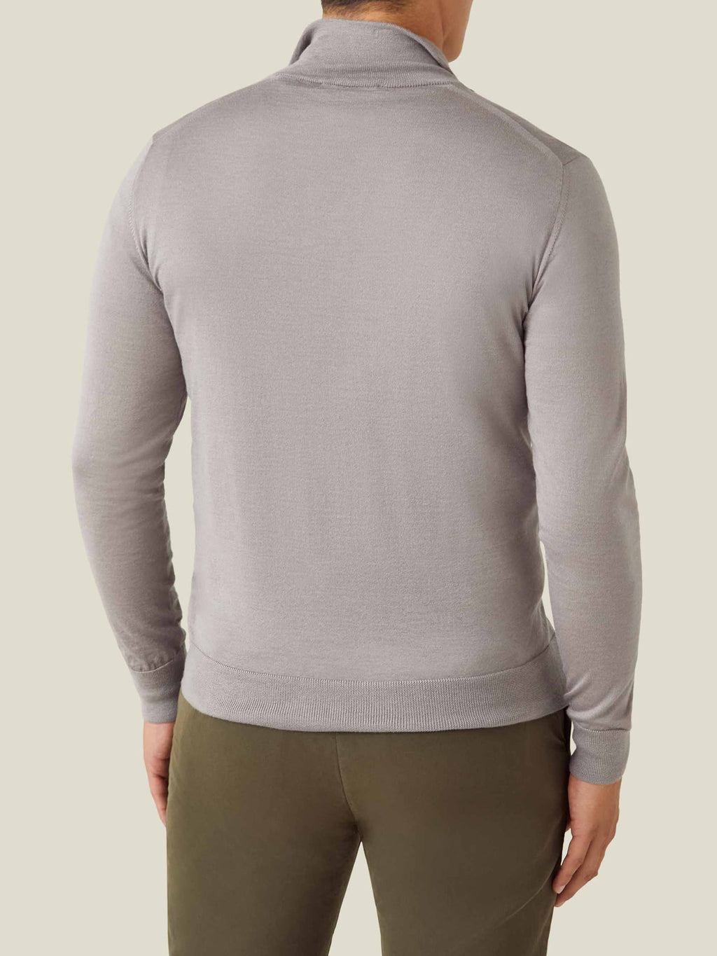 Back view of a man wearing the Nocciola Brown Silk-Cashmere Zip-up, showing the classic silhouette and ribbed hem.