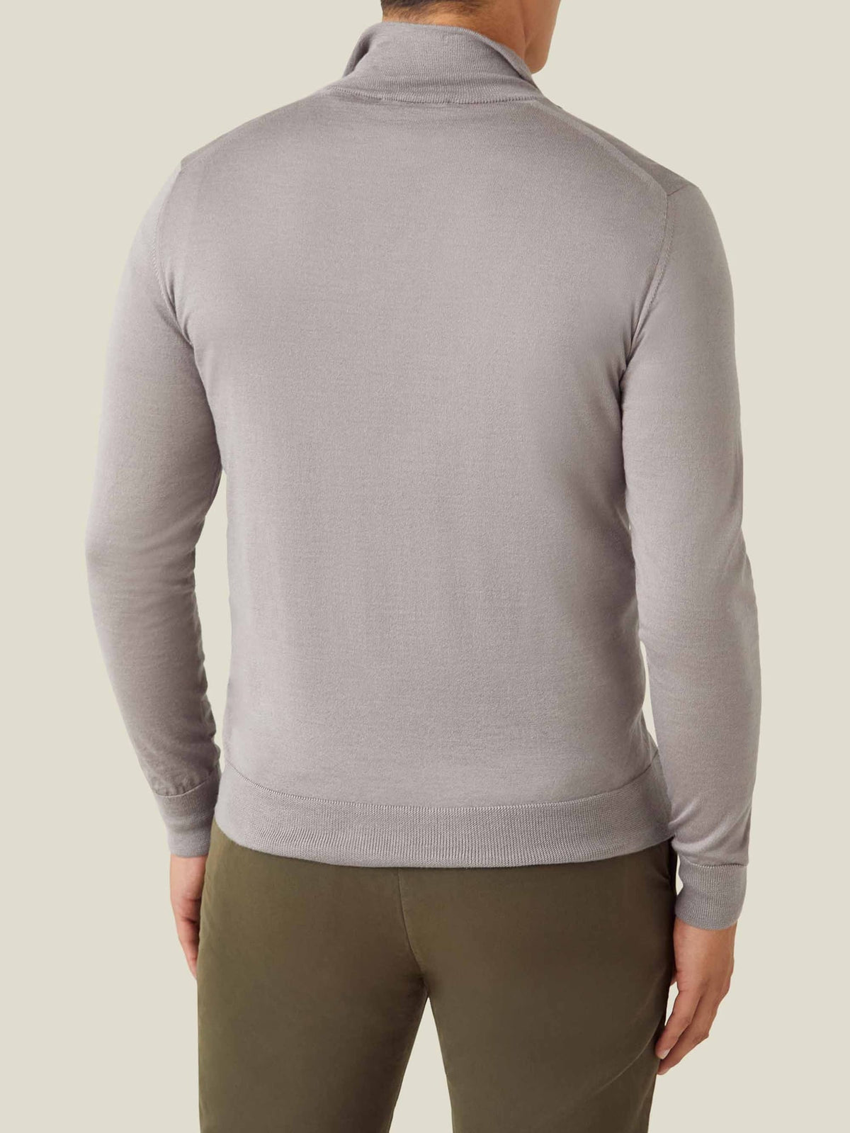 Back view of a man wearing the Nocciola Brown Silk-Cashmere Zip-up, showing the classic silhouette and ribbed hem.