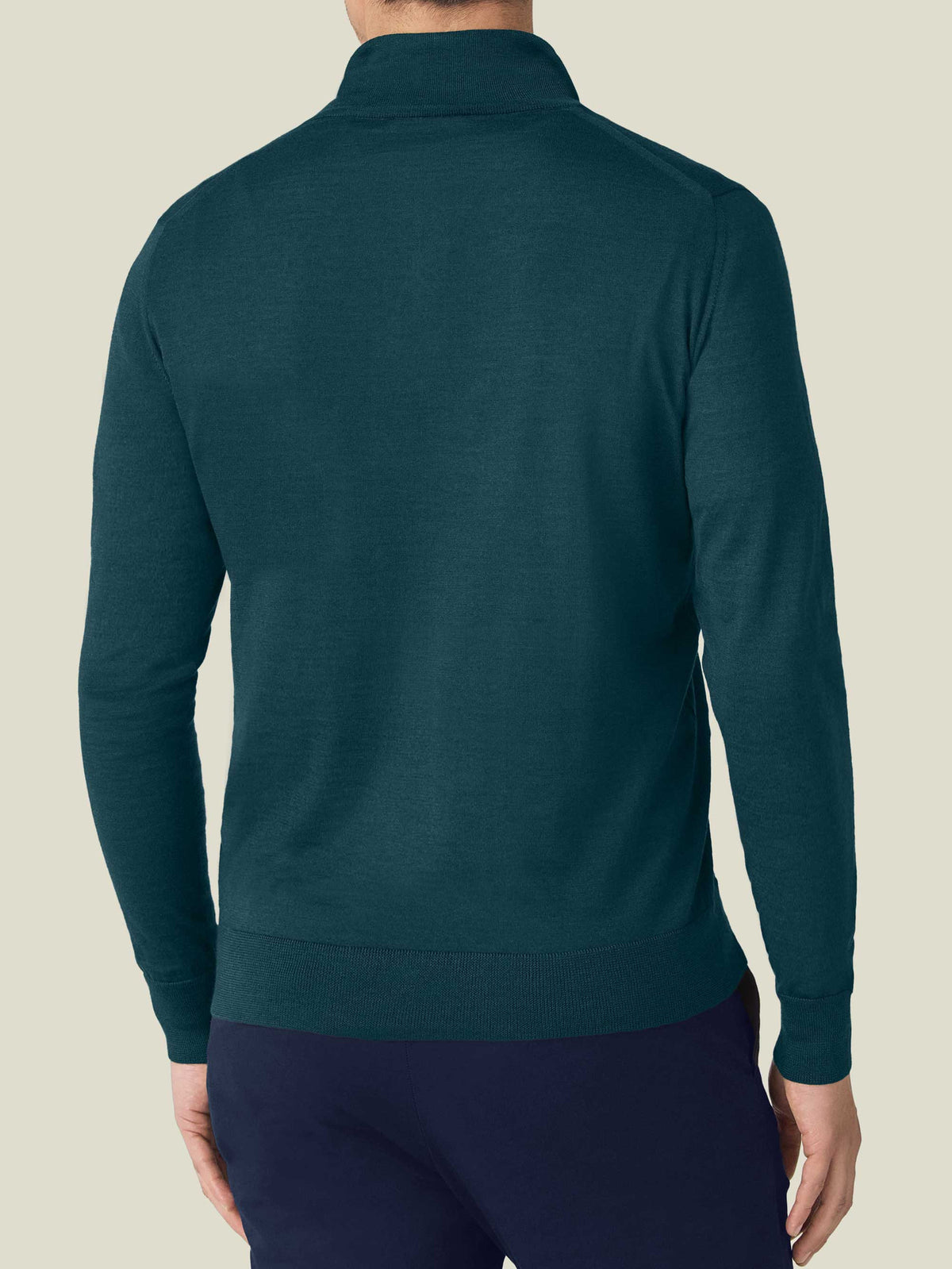 Back view of a man wearing the Luca Faloni Silk-Cashmere Zip-up in forest green, showcasing its refined silhouette.