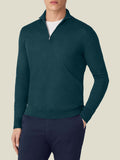 A front view of a model wearing the Luca Faloni Silk-Cashmere Zip-up in Forest Green, styled over a white t-shirt.
