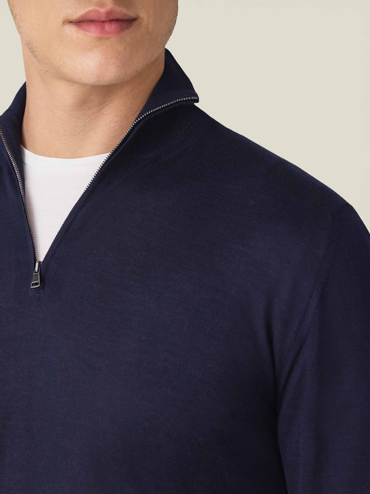 Close-up of a man wearing the Luca Faloni Silk-Cashmere Zip-up in Navy Blue, showing the collar and zip detail.