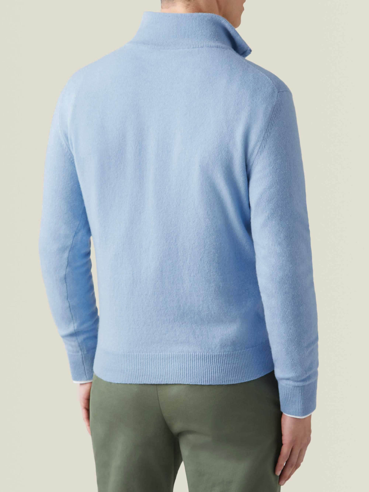 Back view of a man wearing the Luca Faloni Sky Blue Cashmere Zip-up.