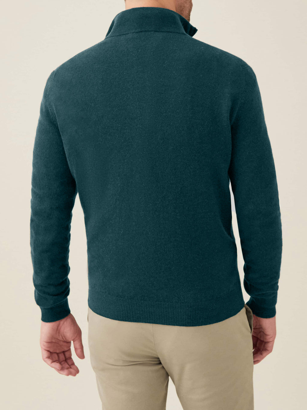 Back view of a man wearing a Luca Faloni Forest Green Cashmere Zip-up.