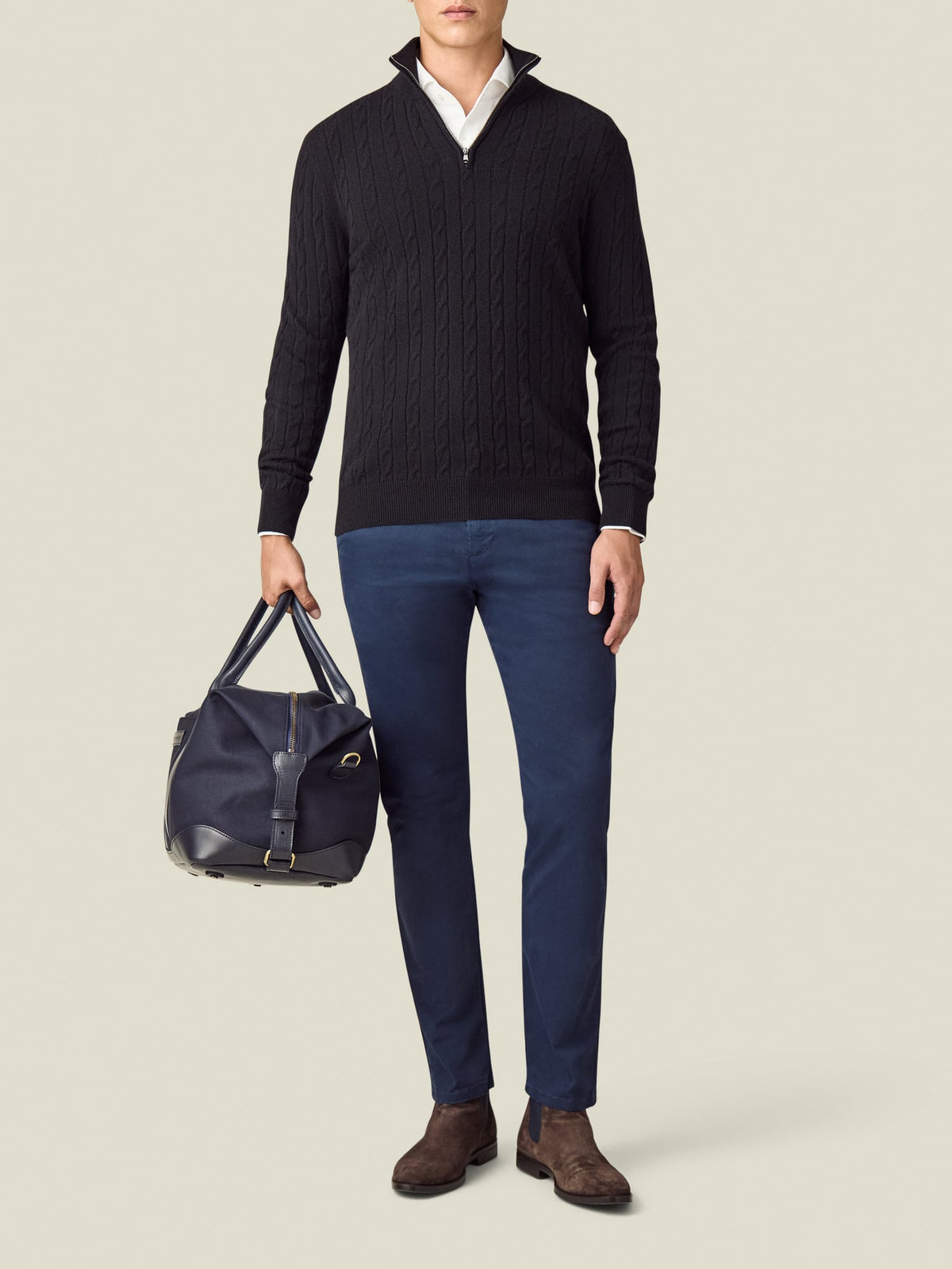 Full-length front view of a model wearing the Luca Faloni black Cable Knit Zip-up.