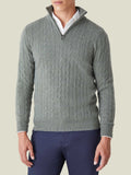 Model wearing the Luca Faloni Moss Green Cable Knit Zip-up over a white shirt with navy trousers, shown from the front.