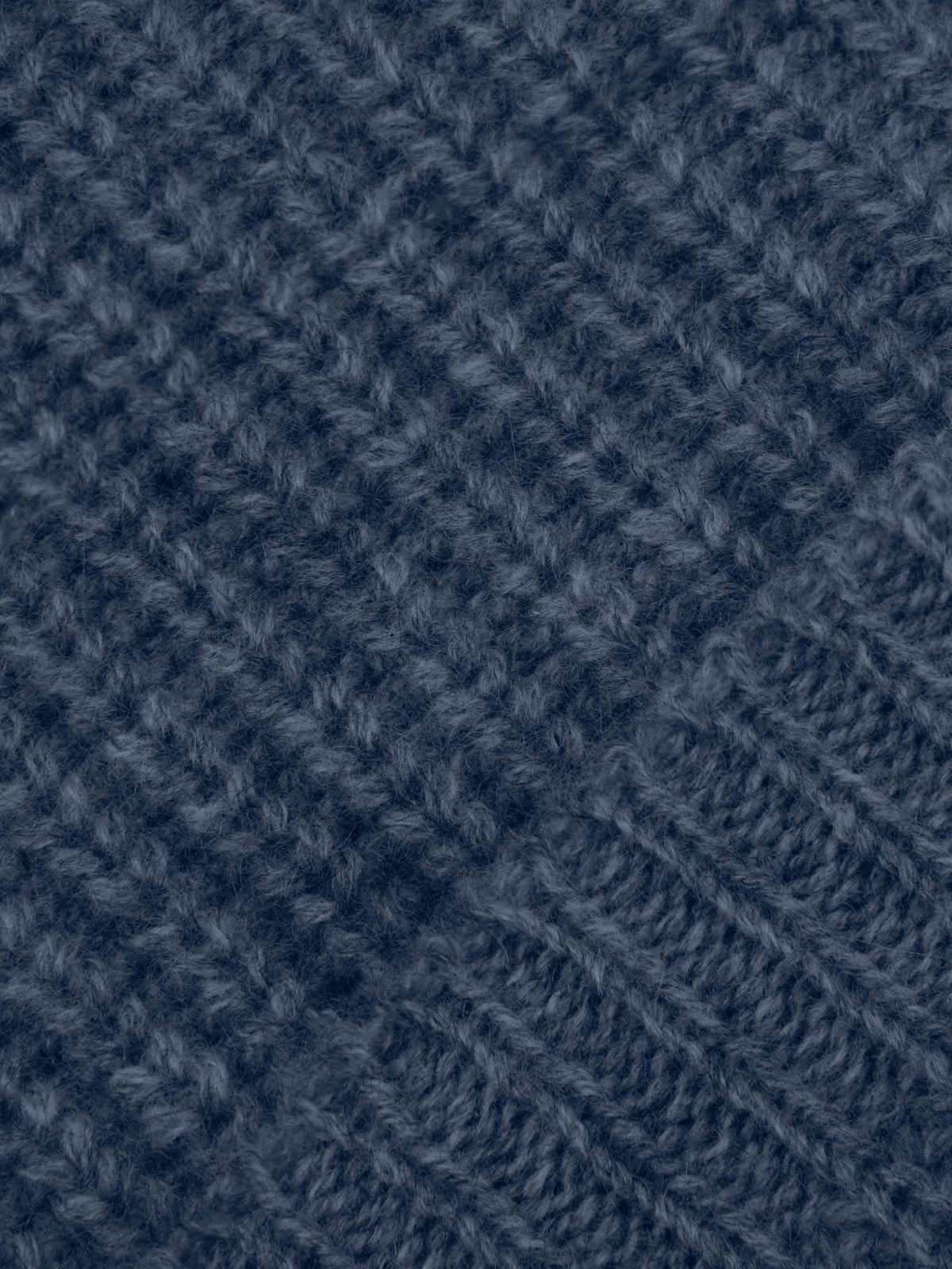 Close-up of the Atlantic Blue Chunky Knit Beanie, showing the detailed ribbed texture of the four-ply cashmere.