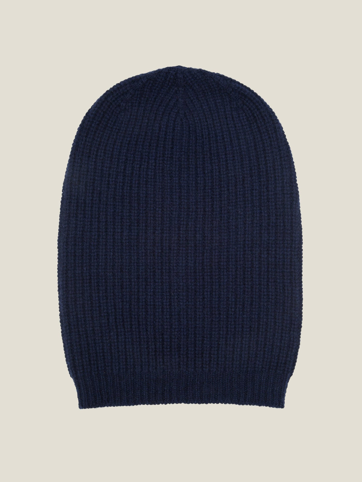Front view of the Luca Faloni Chunky Knit Beanie in Midnight Blue cashmere, laid flat to showcase its ribbed texture.