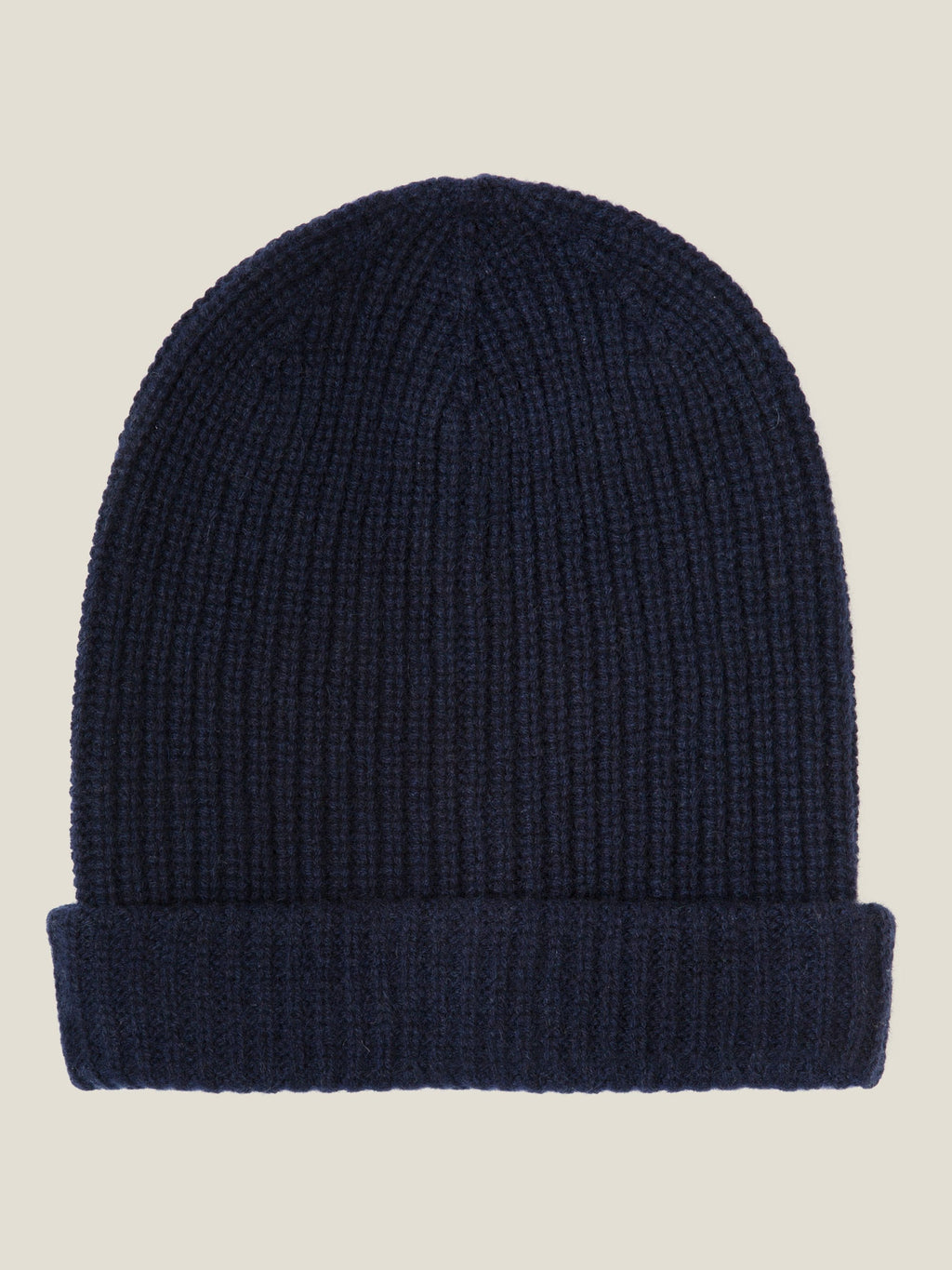 Studio shot of the Luca Faloni Chunky Knit Beanie in Midnight Blue, crafted from ribbed four-ply cashmere.