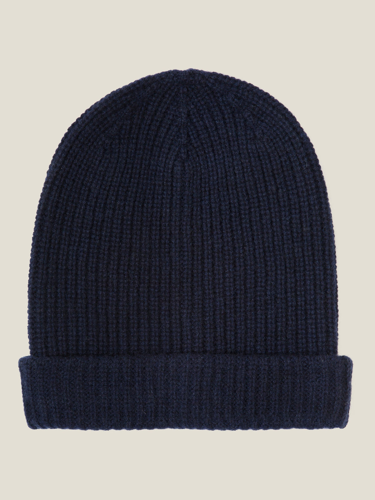 Studio shot of the Luca Faloni Chunky Knit Beanie in Midnight Blue, crafted from ribbed four-ply cashmere.
