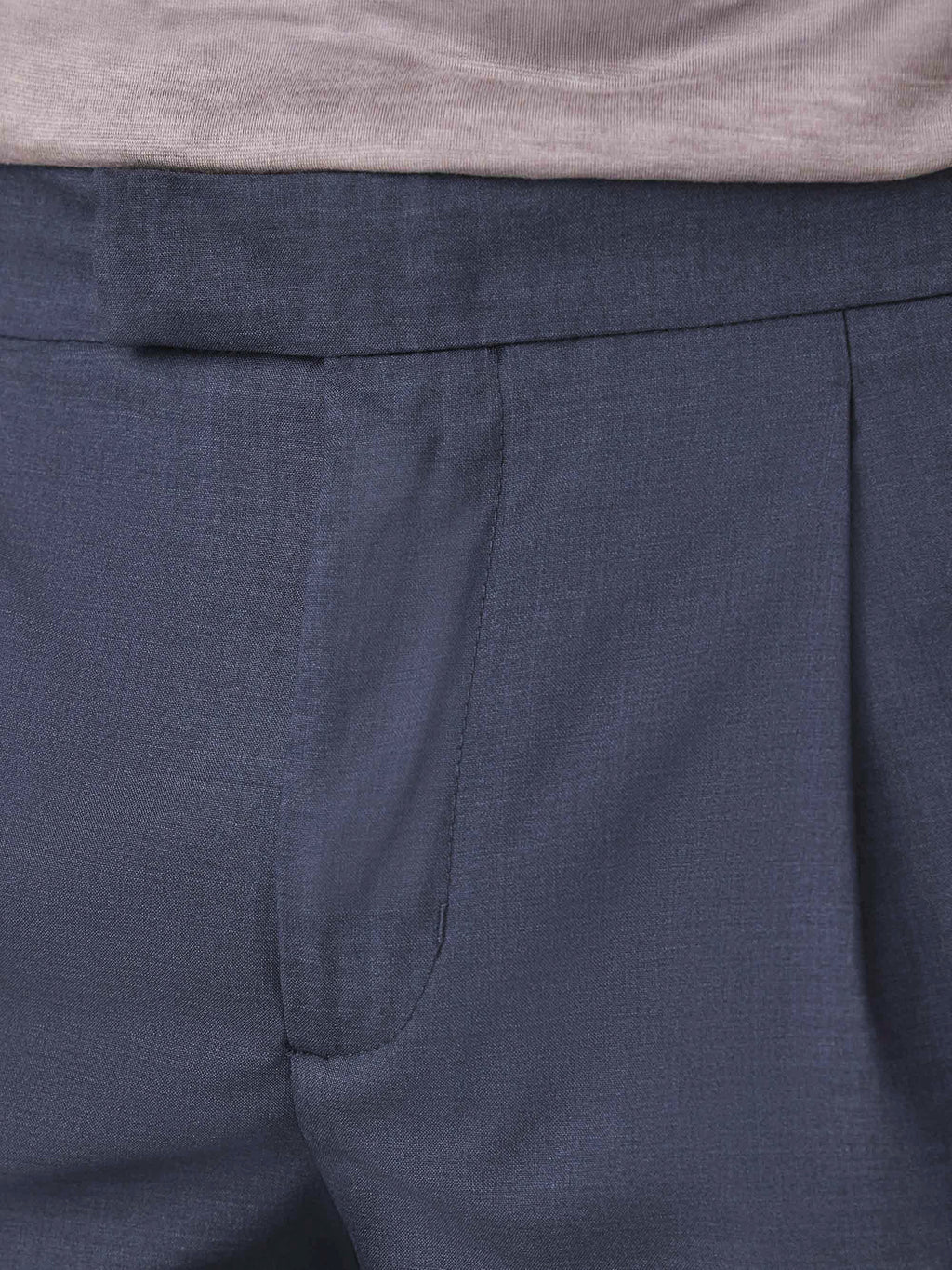 A detailed close-up of the waistband, front pleat, and pocket of the Classic Blue Lightweight Wool Trousers.