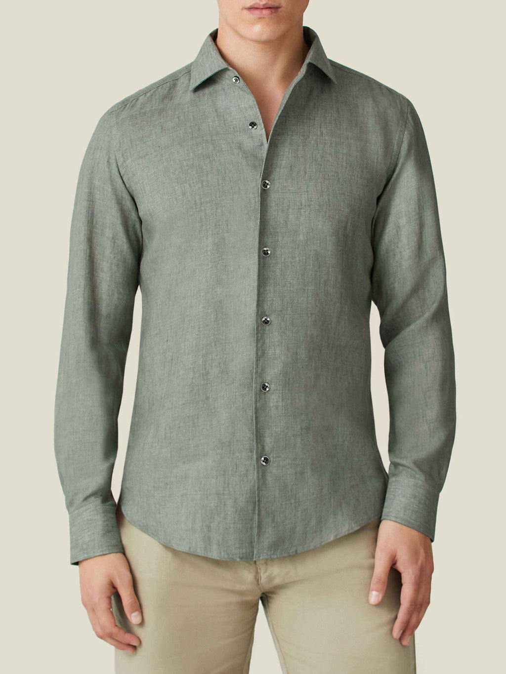Front view of a model wearing the Portofino Linen Shirt in Safari Green.