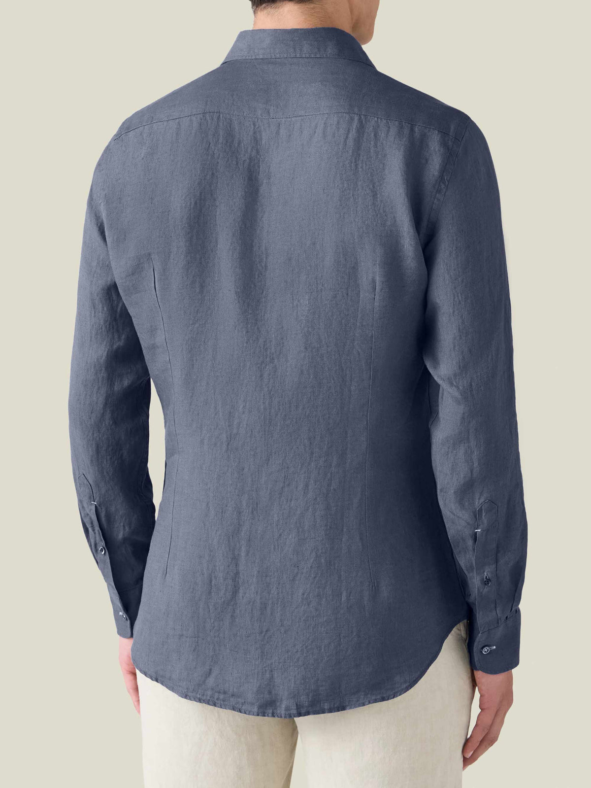 Rear view of the Portofino Linen Shirt in Payne's Grey, showing its tailored silhouette and fine linen texture.