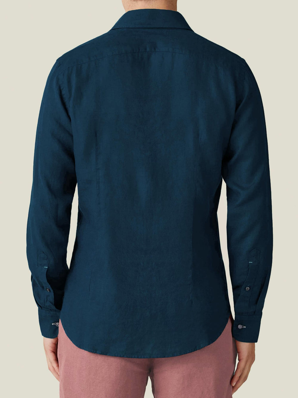 Back view of the Luca Faloni Portofino Linen Shirt in midnight blue, worn by a model.