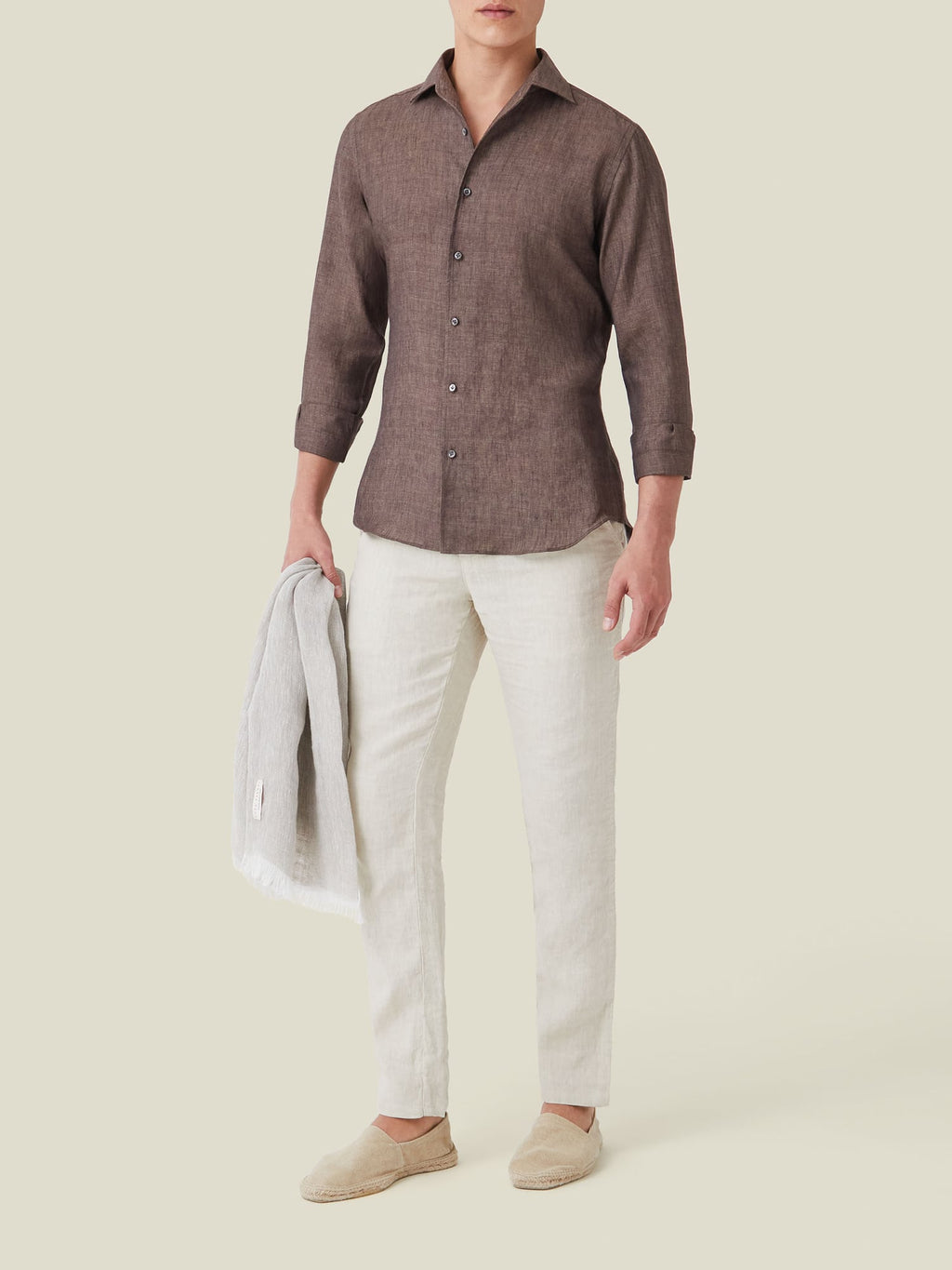 Model wearing the Chocolate Brown Portofino Linen Shirt, styled with off-white linen trousers and suede espadrilles.